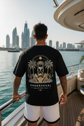 Chronakaal Black Tee — Back Print Confident Pose